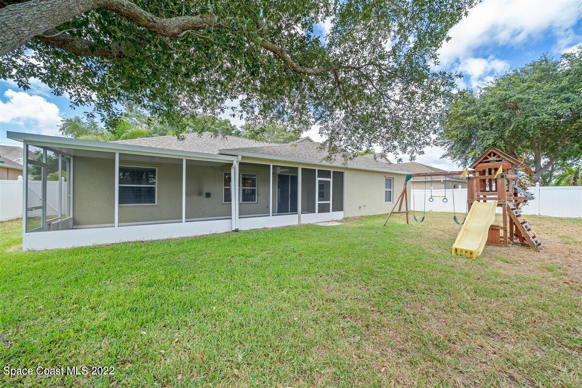 320 Pebble Hill Way Rockledge, FL 32955 - Photo 27 of 27 a view of a house with a backyard