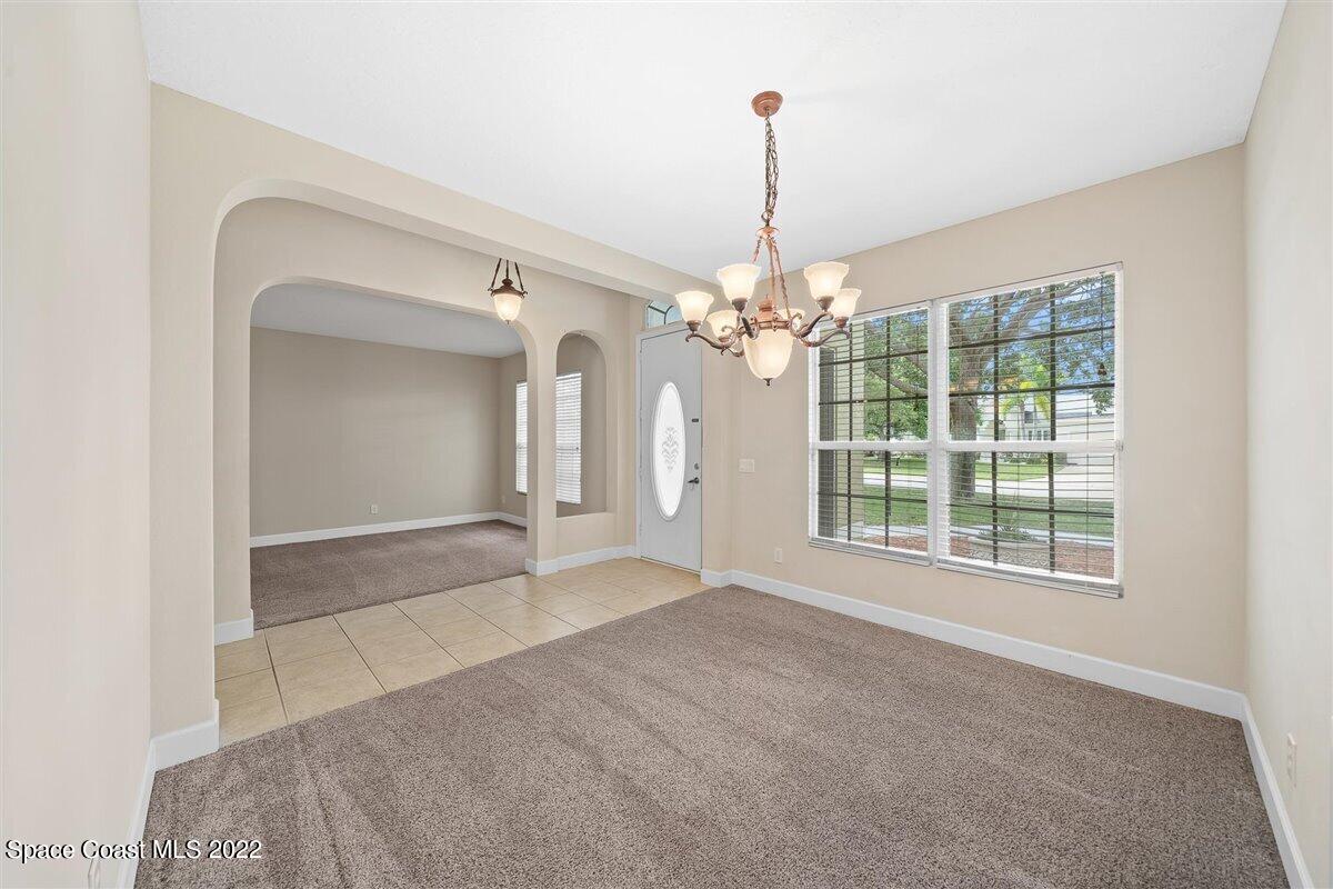 320 Pebble Hill Way Rockledge, FL 32955 - Photo 5 of 27 a view of an empty room with a window