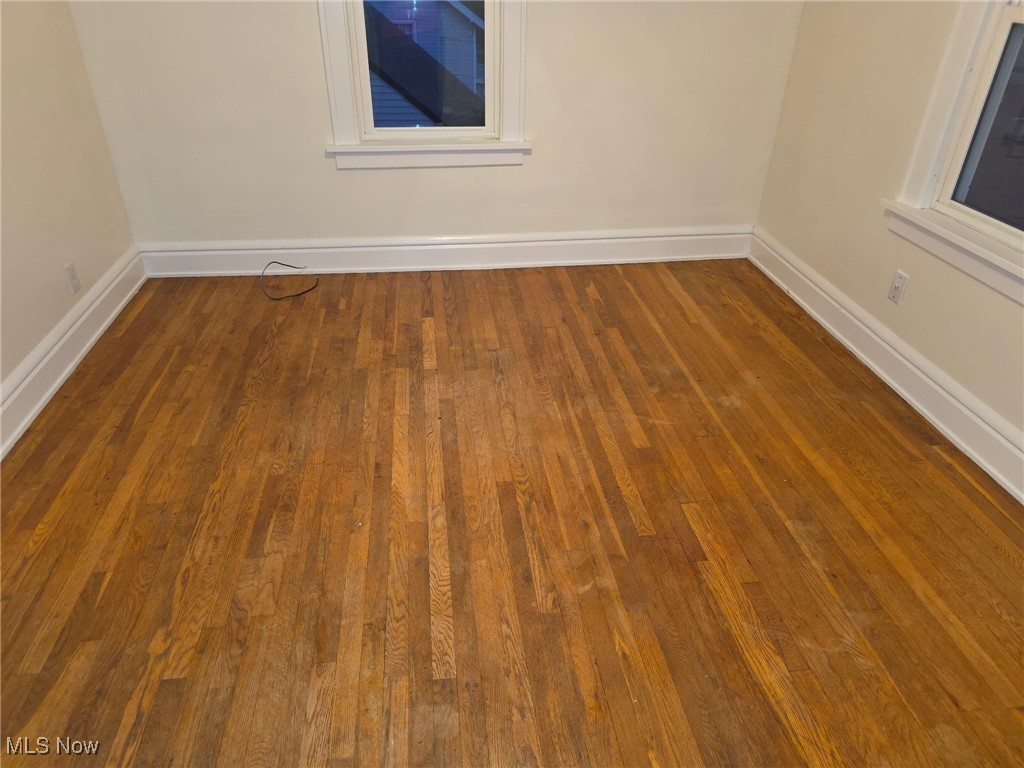 64 Sheldon Street Rittman, OH 44270 - Photo 18 of 37 Unfurnished room with dark wood-style flooring