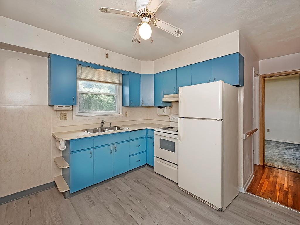 2488 Banks School Road Gibsonia, PA 15044 - Photo 11 of 31 a kitchen with refrigerator a sink and dishwasher