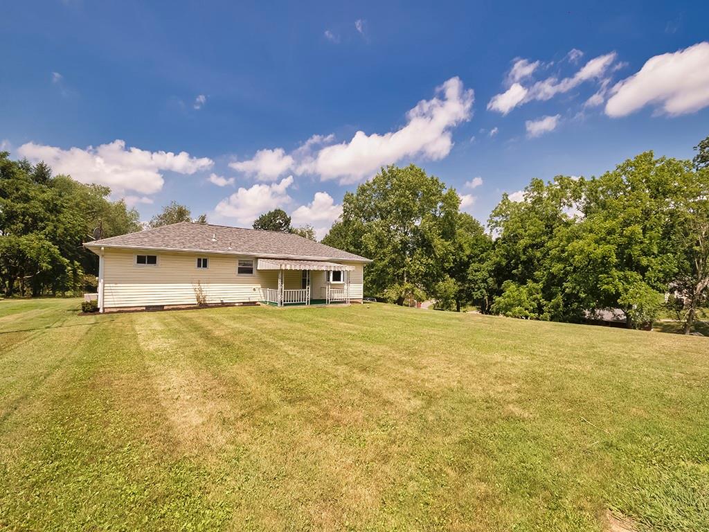 2488 Banks School Road Gibsonia, PA 15044 - Photo 28 of 31 a front view of a house with a big yard