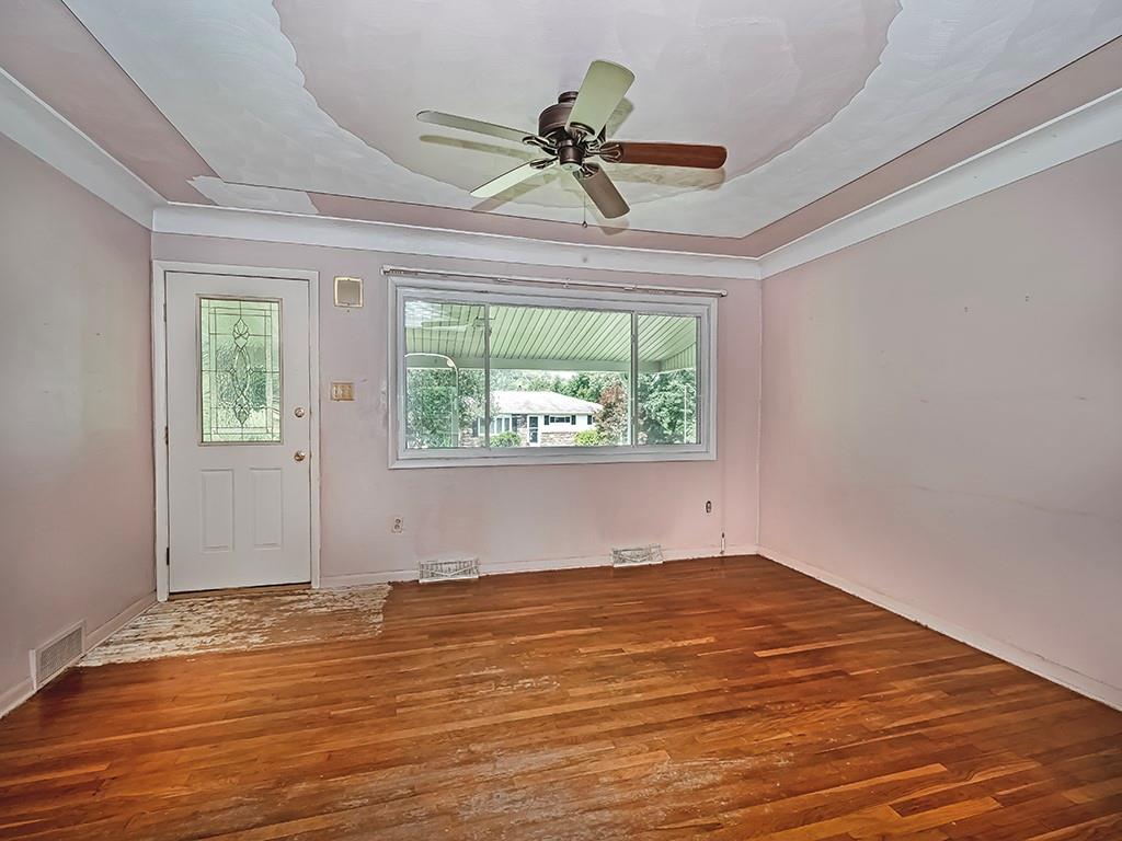 2488 Banks School Road Gibsonia, PA 15044 - Photo 5 of 31 wooden floor in an empty room with a window