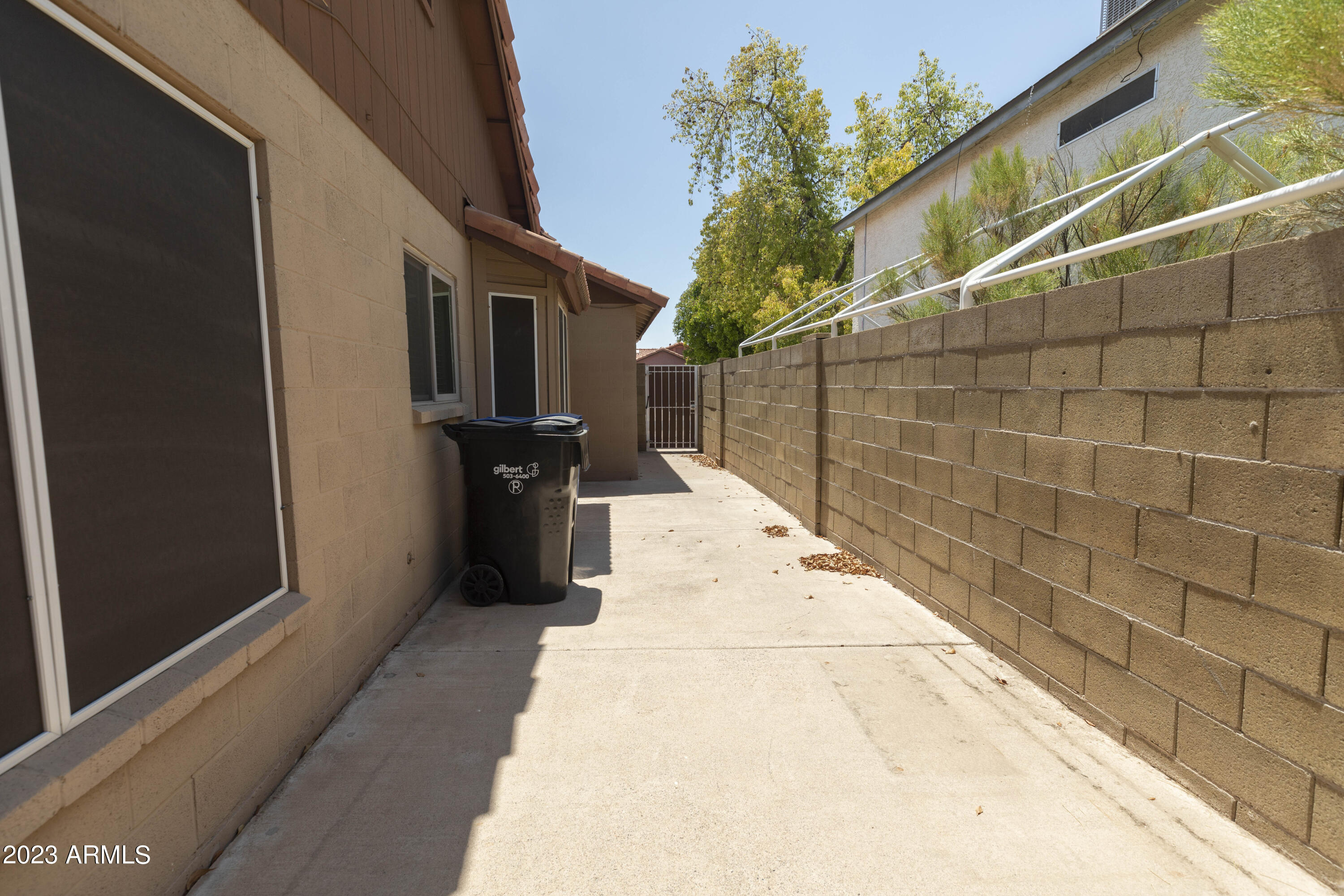 608 East Appaloosa Road Gilbert, AZ 85296 - Photo 29 of 38 a black and white building with wooden floor in front of it