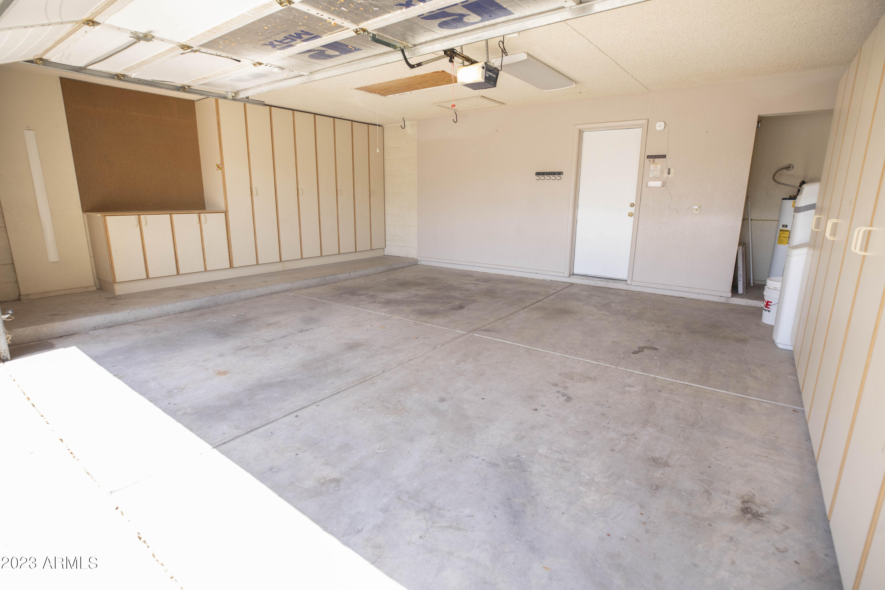 608 East Appaloosa Road Gilbert, AZ 85296 - Photo 32 of 38 a view of a hallway with a hallway