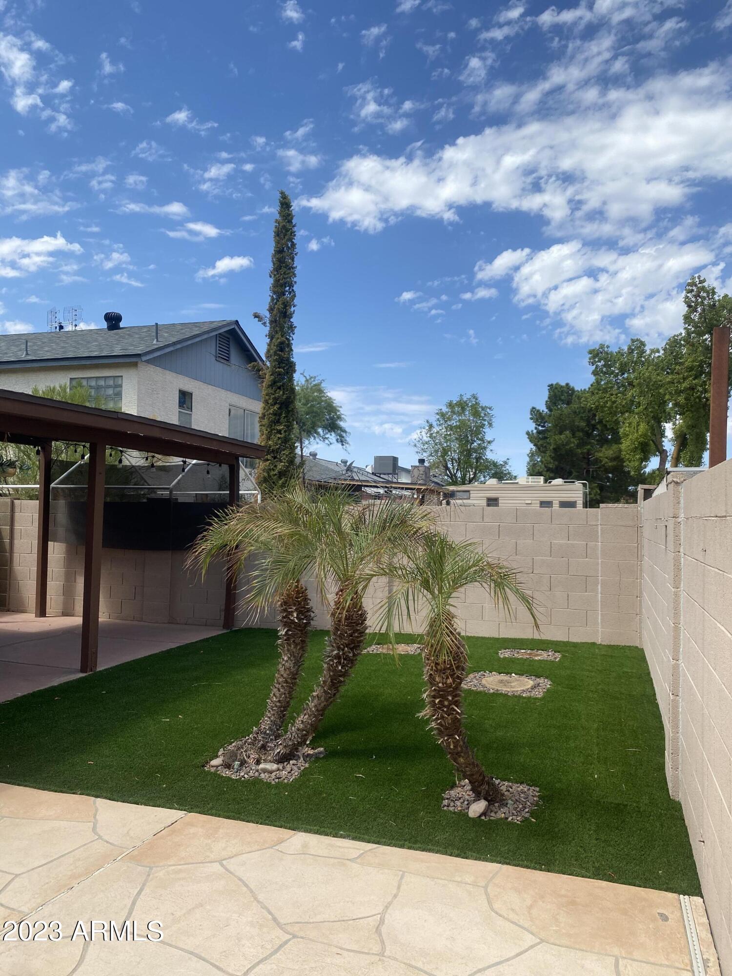 608 East Appaloosa Road Gilbert, AZ 85296 - Photo 38 of 38 a view of a swimming pool with a yard