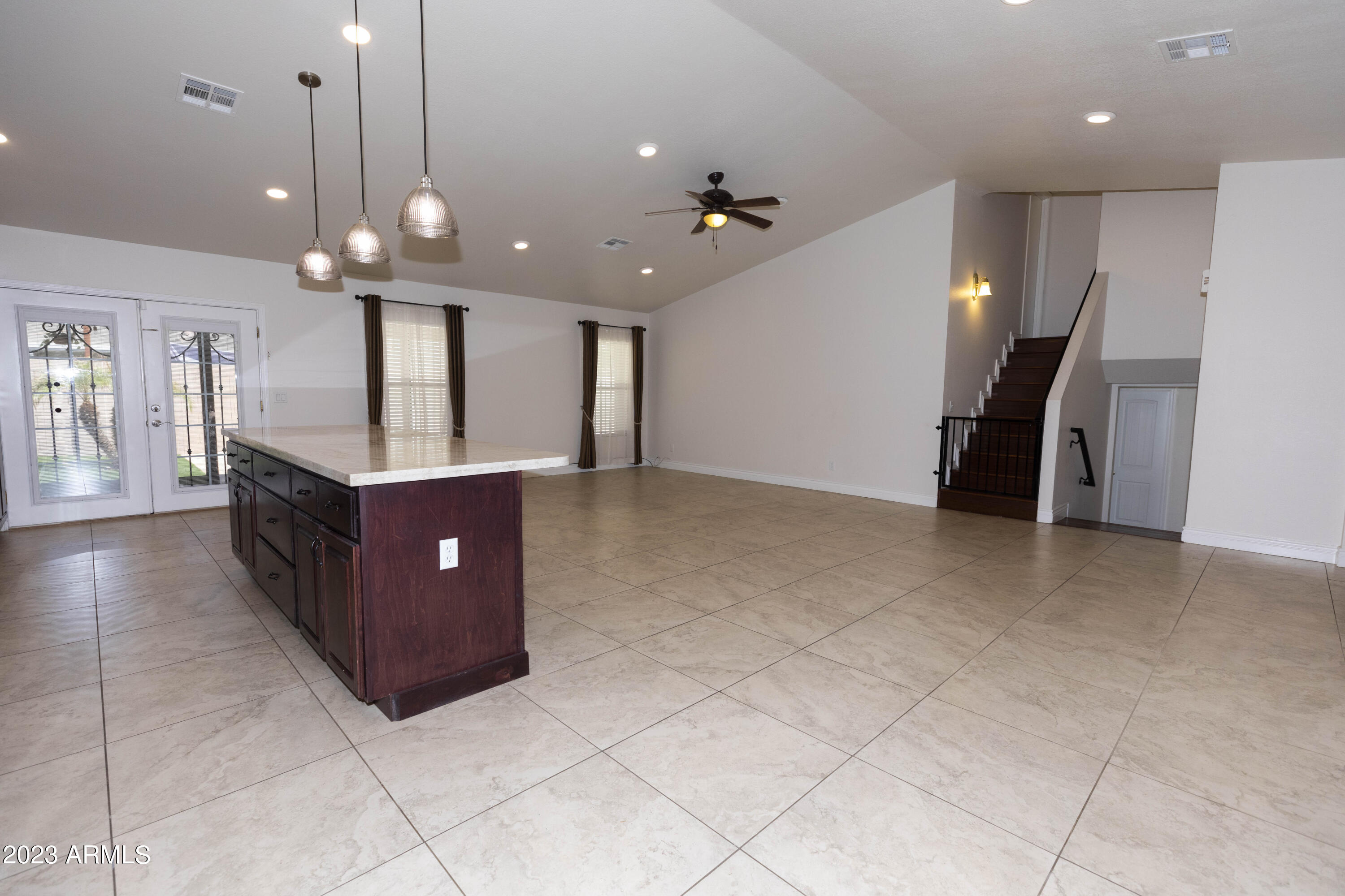 608 East Appaloosa Road Gilbert, AZ 85296 - Photo 5 of 38 a kitchen with a cabinets and chandelier