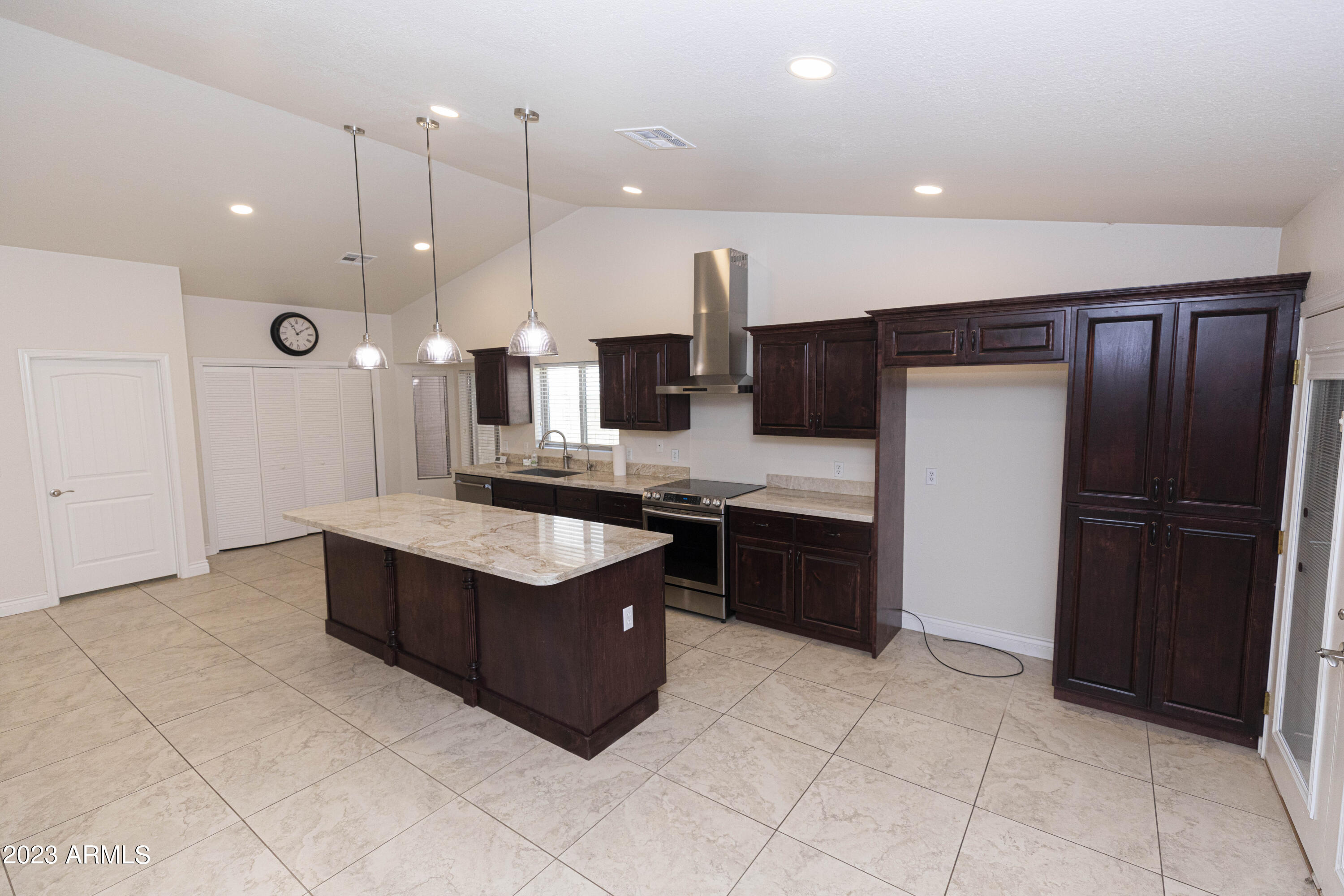608 East Appaloosa Road Gilbert, AZ 85296 - Photo 7 of 38 a kitchen with stainless steel appliances granite countertop a refrigerator and a sink