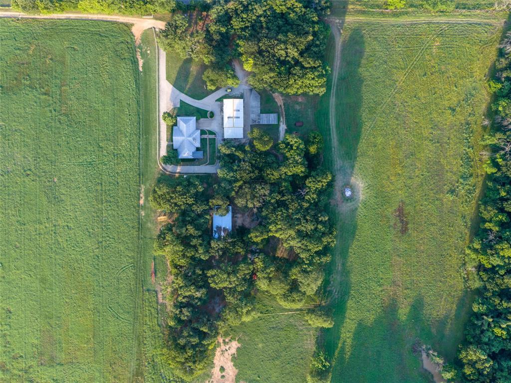 449 Private Road 4670 Rhome, TX 76078 - Photo 16 of 39 a view of a garden