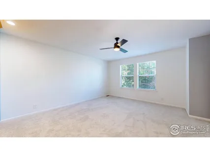 a black and white photo of a living room