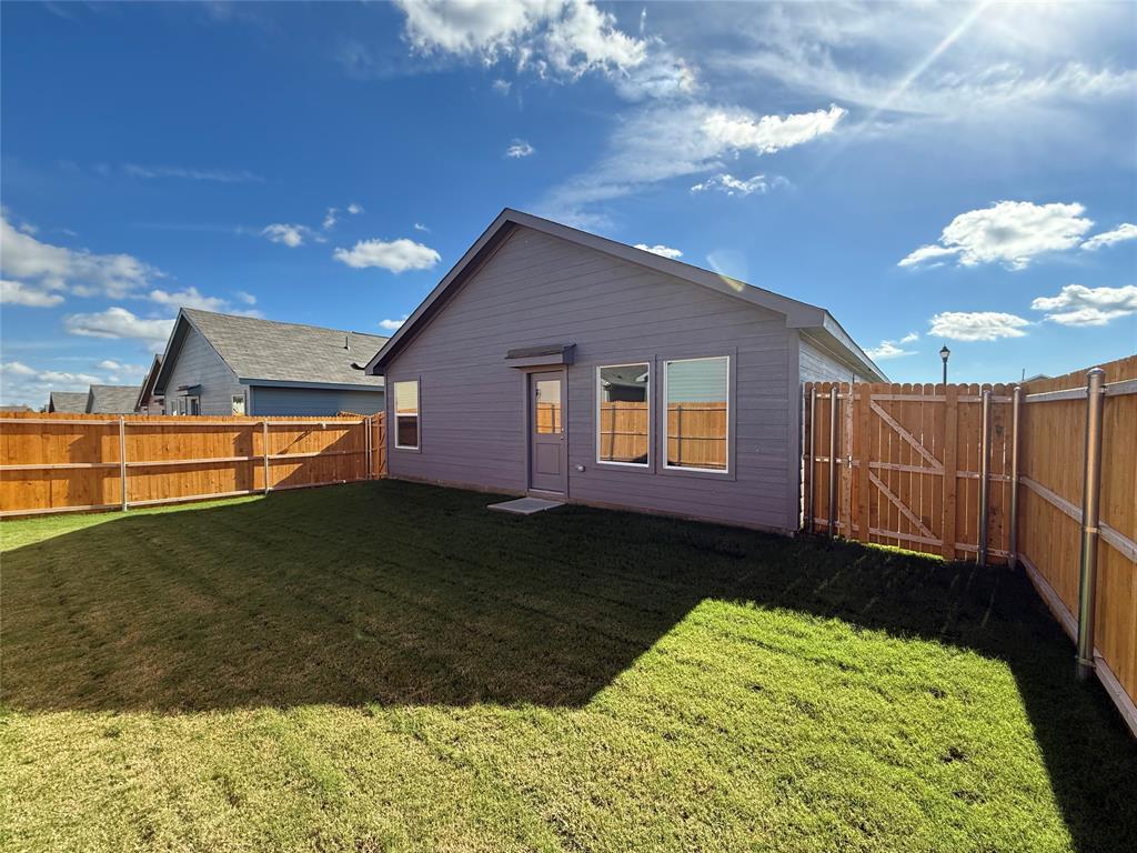 1005 Calley Pear Trail Princeton, TX 75407 - Photo 19 of 20 a backyard of a house