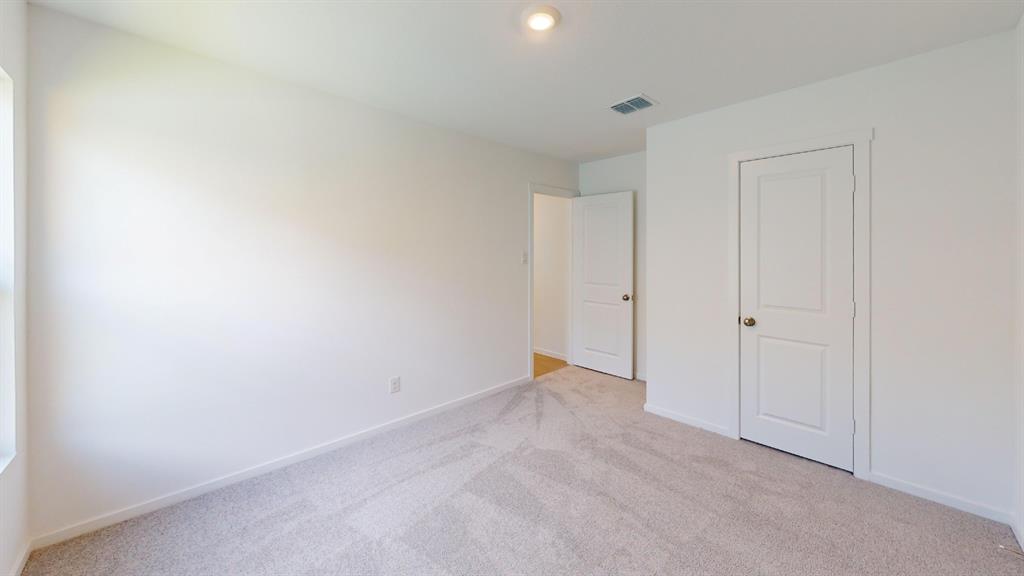 1005 Calley Pear Trail Princeton, TX 75407 - Photo 9 of 20 a view of an empty room