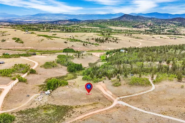 a view of an ocean and a mountain