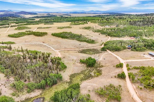 a view of an ocean and a mountain