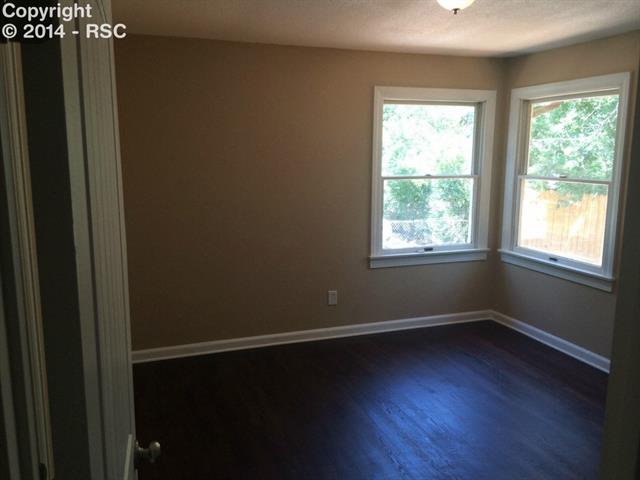 838 East Rio Grande Street Colorado Springs, CO 80903 - Photo 14 of 25 main level bedroom, one of two, plenty of storage