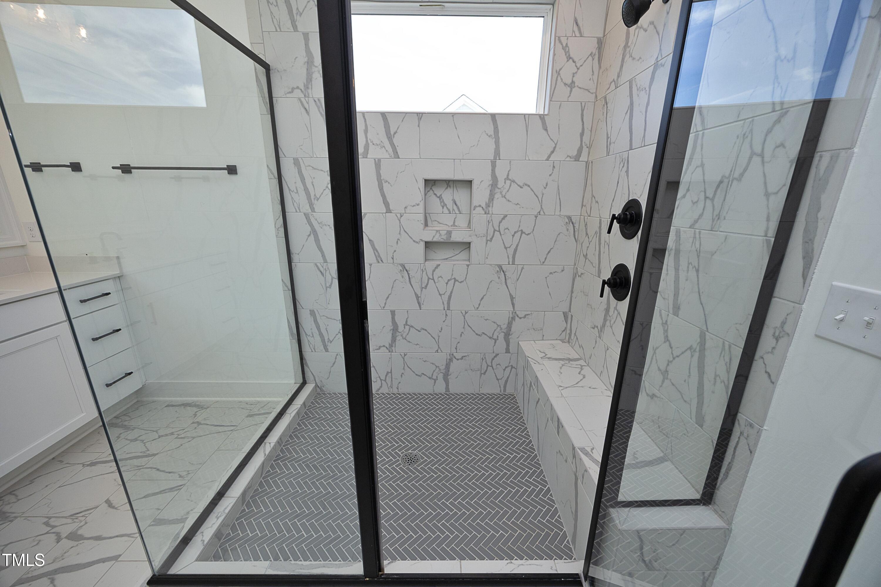 1145 Duke Farm Drive Wake Forest, NC 27587 - Photo 20 of 37 a bathroom with a shower