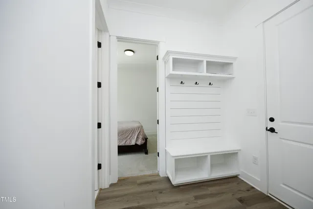 a bathroom with a shower and a sink