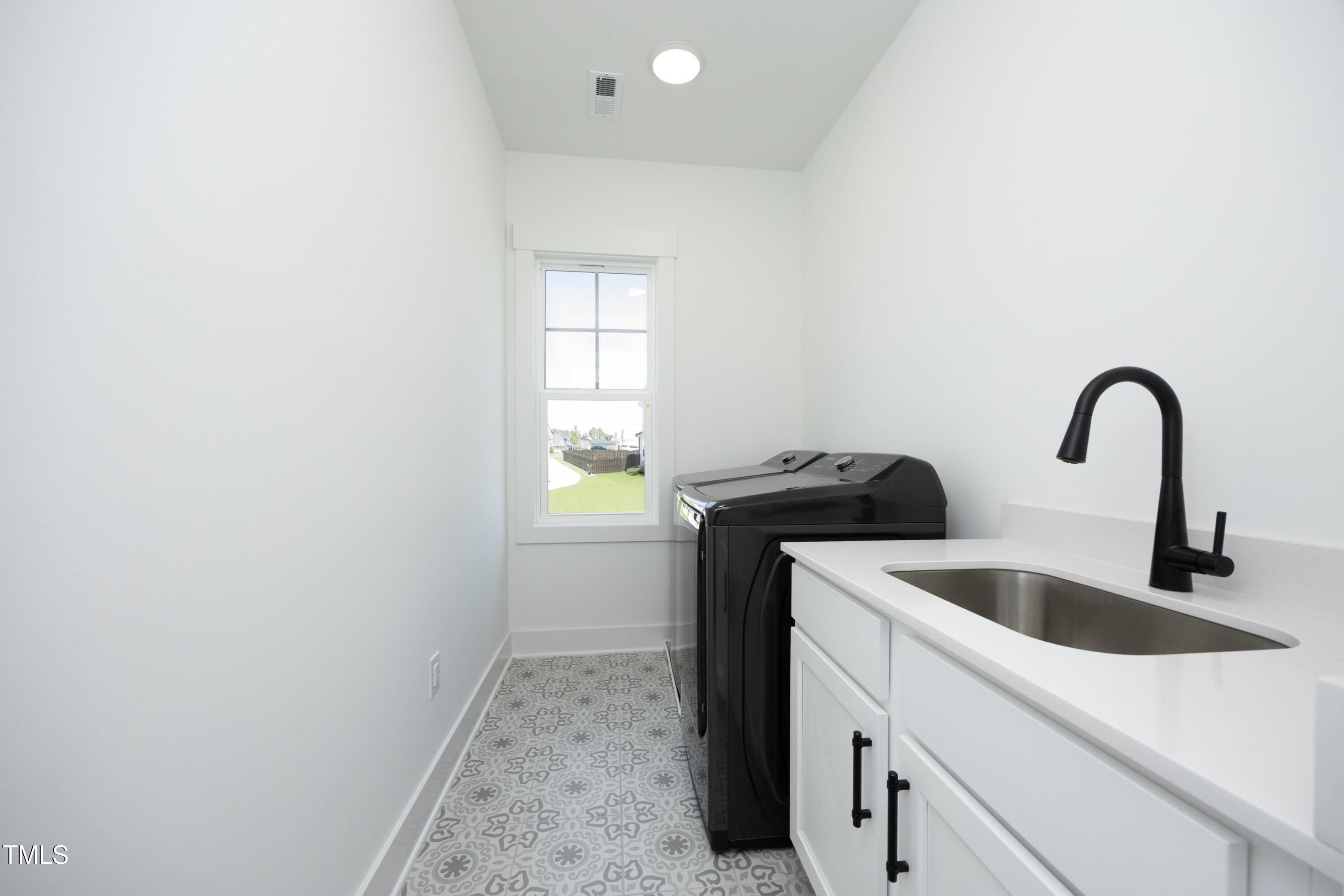 1145 Duke Farm Drive Wake Forest, NC 27587 - Photo 29 of 37 a close view of sink and tap