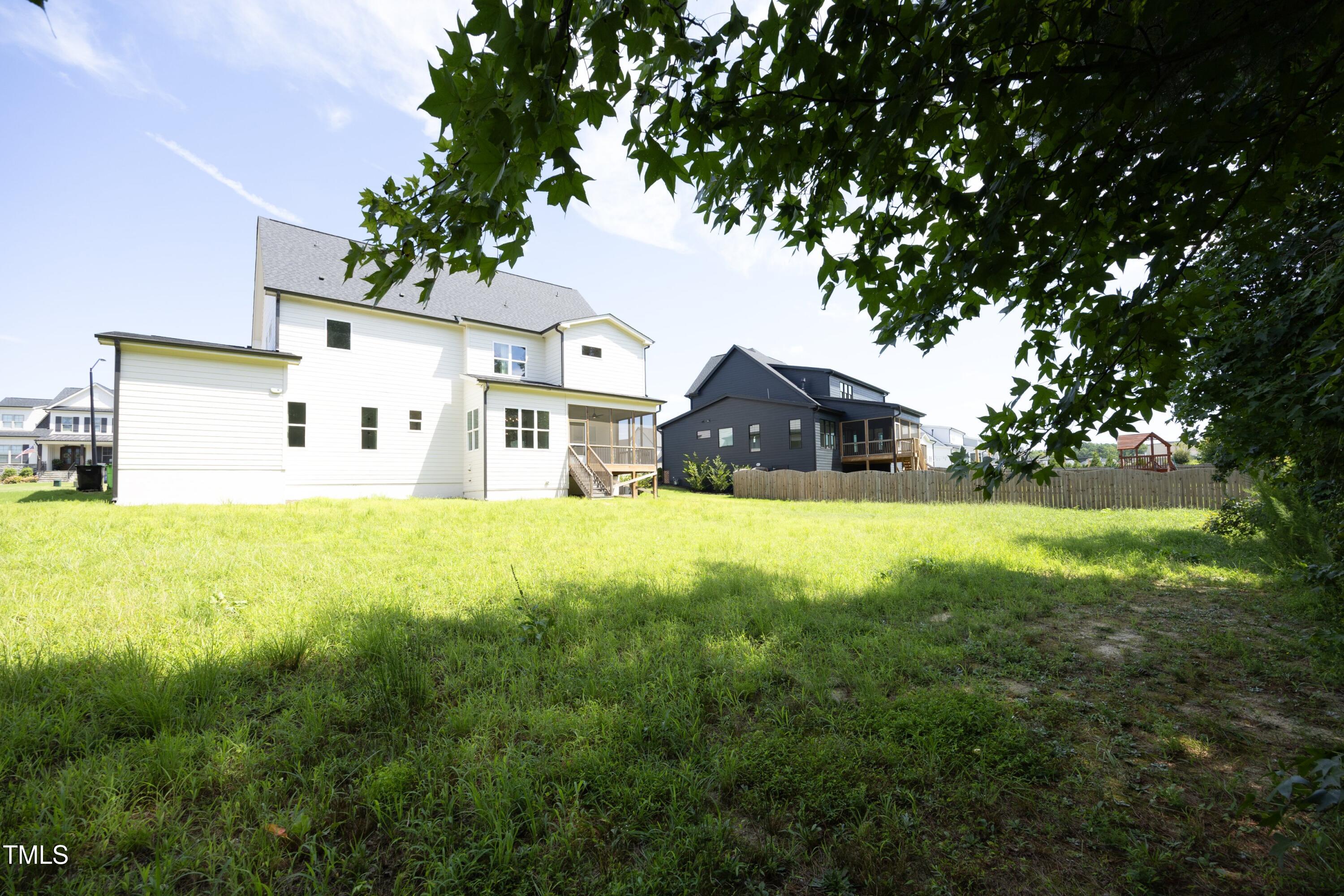 1145 Duke Farm Drive Wake Forest, NC 27587 - Photo 33 of 37 a front view of a house with garden