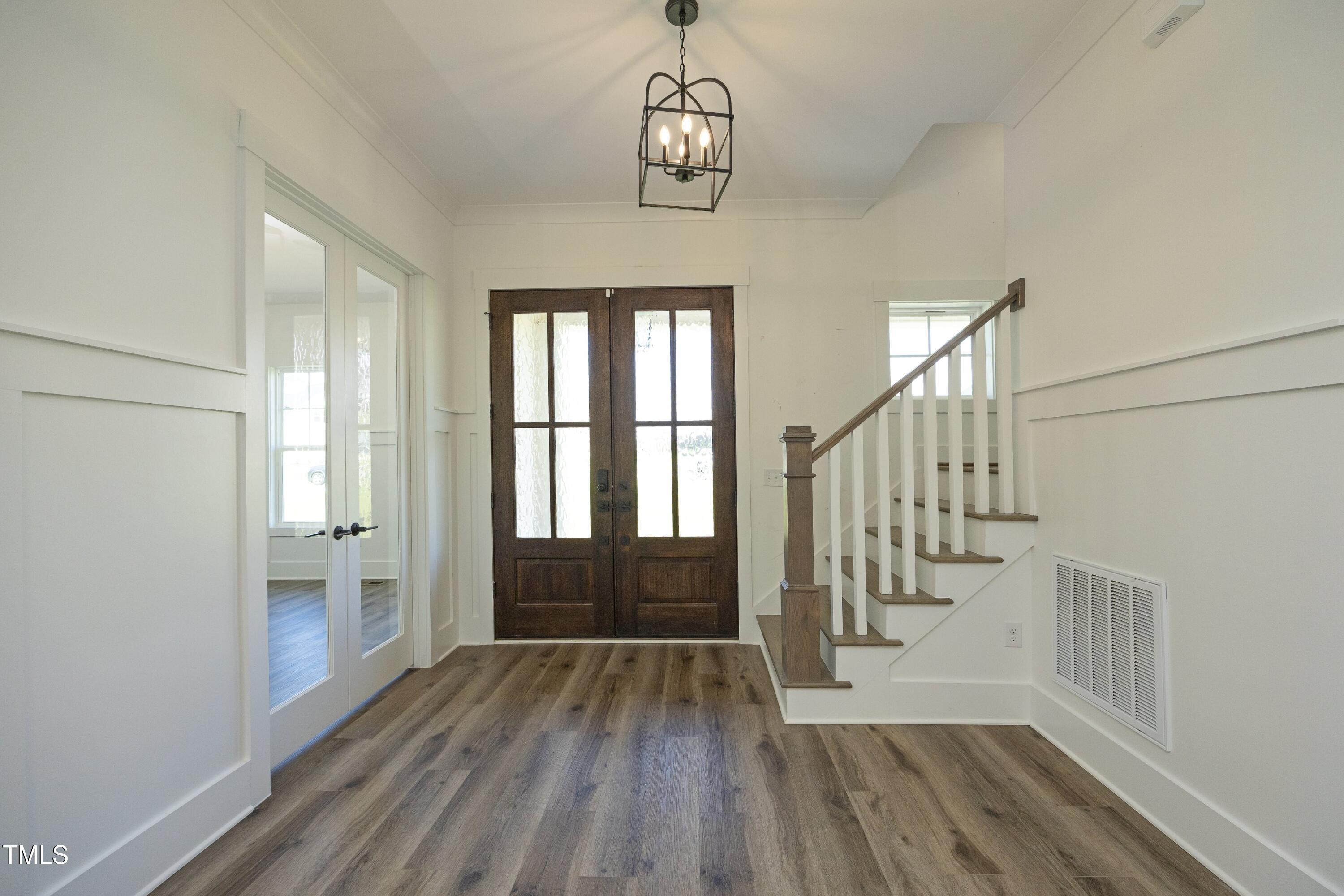 1145 Duke Farm Drive Wake Forest, NC 27587 - Photo 4 of 37 a view of entryway with wooden floor