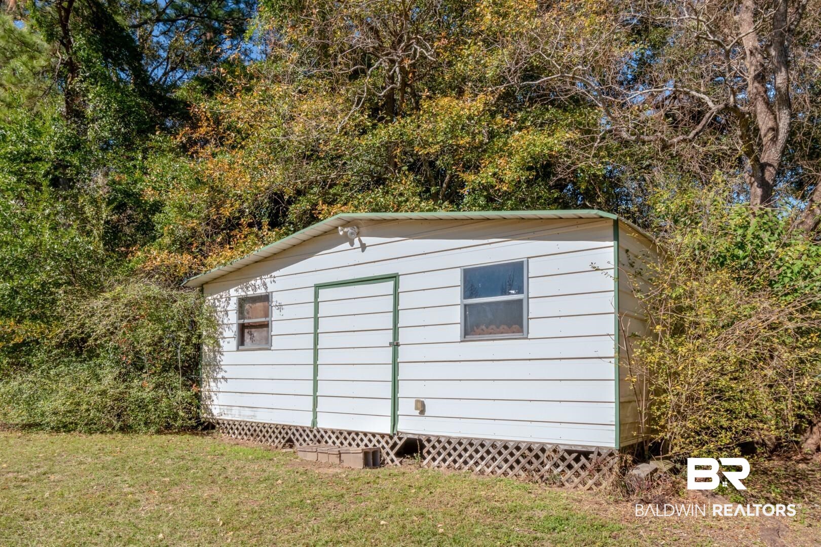 8304 Champlain Circle Mobile, AL 36695 - Photo 34 of 46 View of outdoor structure with a lawn