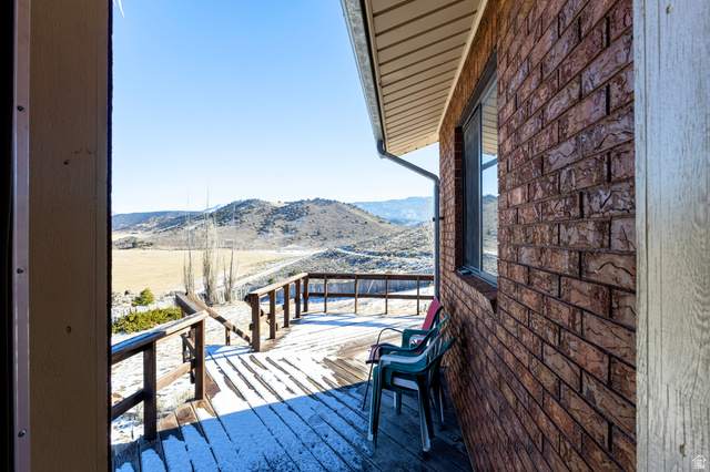 1208 East Tidwell Road Loa, UT 84747 - Photo 8 of 40 Wooden deck featuring a mountain view