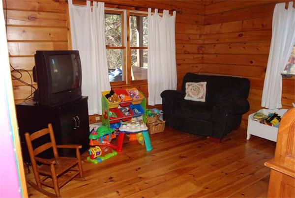 40 Kimball Road Amesbury, MA 01913 - Photo 14 of 24 a living room with fireplace furniture and a wooden floor