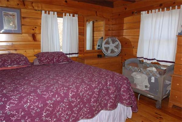 40 Kimball Road Amesbury, MA 01913 - Photo 15 of 24 a bedroom with a bed and a chair