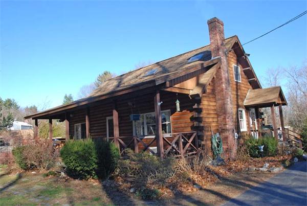 40 Kimball Road Amesbury, MA 01913 - Photo 2 of 24 a backyard of a house with table and chairs
