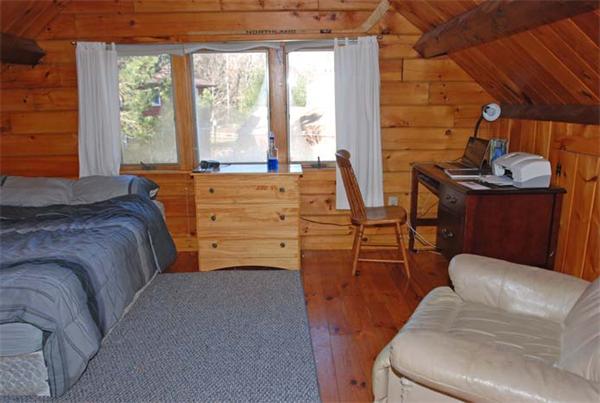 40 Kimball Road Amesbury, MA 01913 - Photo 22 of 24 a bedroom with a bed and large windows