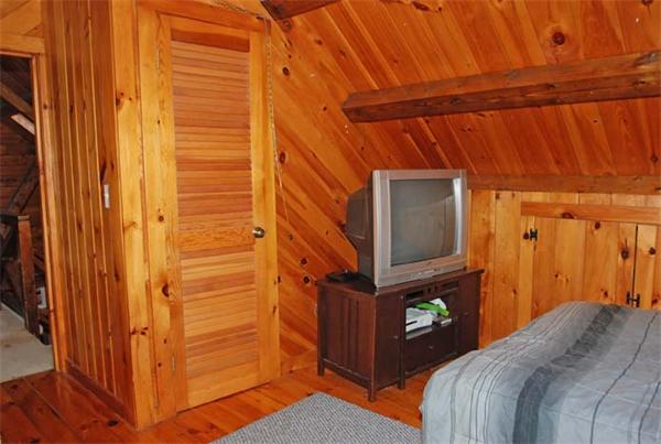 40 Kimball Road Amesbury, MA 01913 - Photo 23 of 24 a bed room with a bed and a mirror
