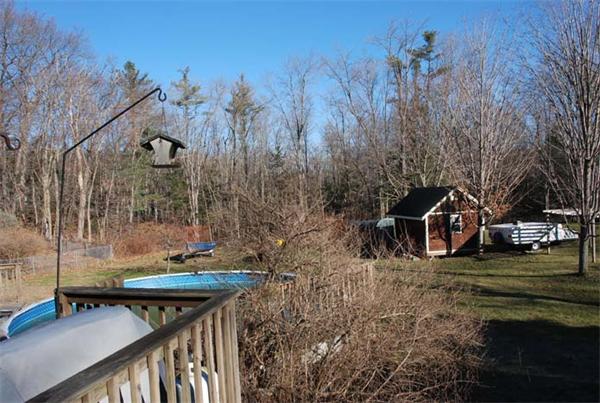 40 Kimball Road Amesbury, MA 01913 - Photo 24 of 24 a view of a house with backyard and sitting area