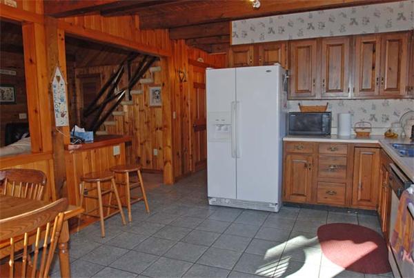 40 Kimball Road Amesbury, MA 01913 - Photo 4 of 24 storage and utility room with wooden floor