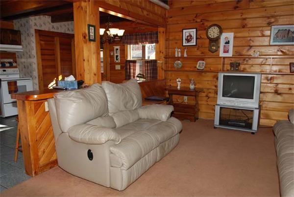 40 Kimball Road Amesbury, MA 01913 - Photo 8 of 24 a living room with furniture and a fireplace