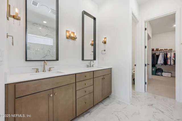 an aerial view of a house with a swimming pool