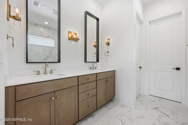 a front view of a house with a big yard