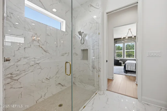 a view of a swimming pool with a table and chairs