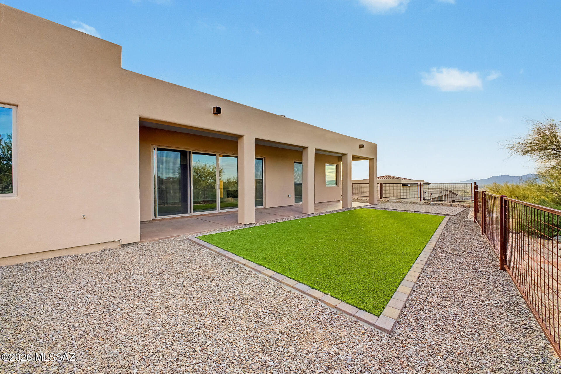 2399 Della Roccia Court Tucson, AZ 85737 - Photo 32 of 34 a view of a house with a backyard