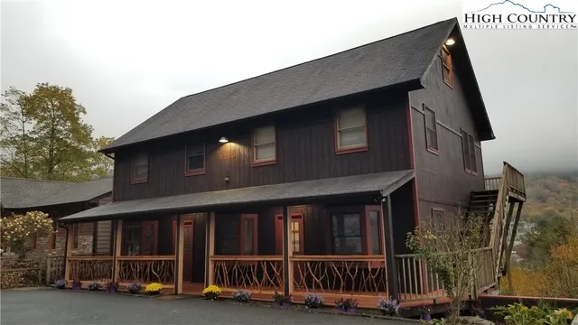 a front view of a house with balcony