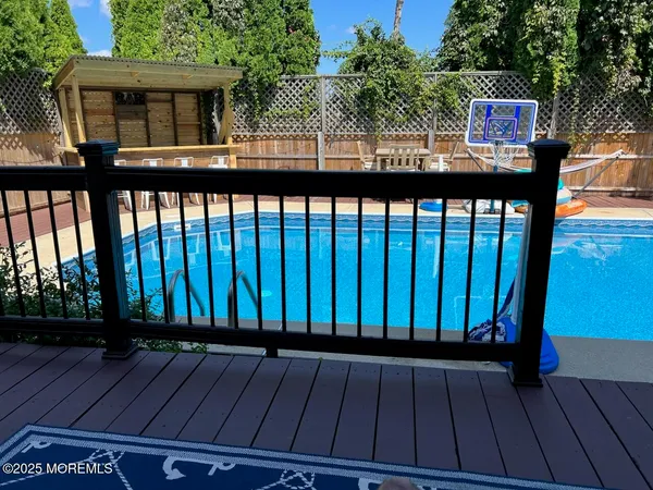 a view of a swimming pool with an outdoor space