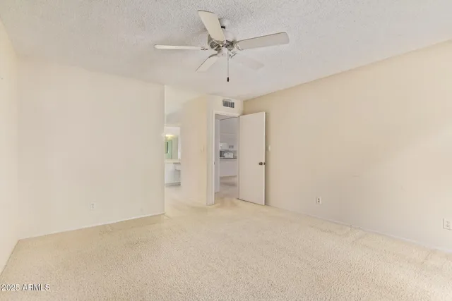 a white toilet sitting next to a bathroom
