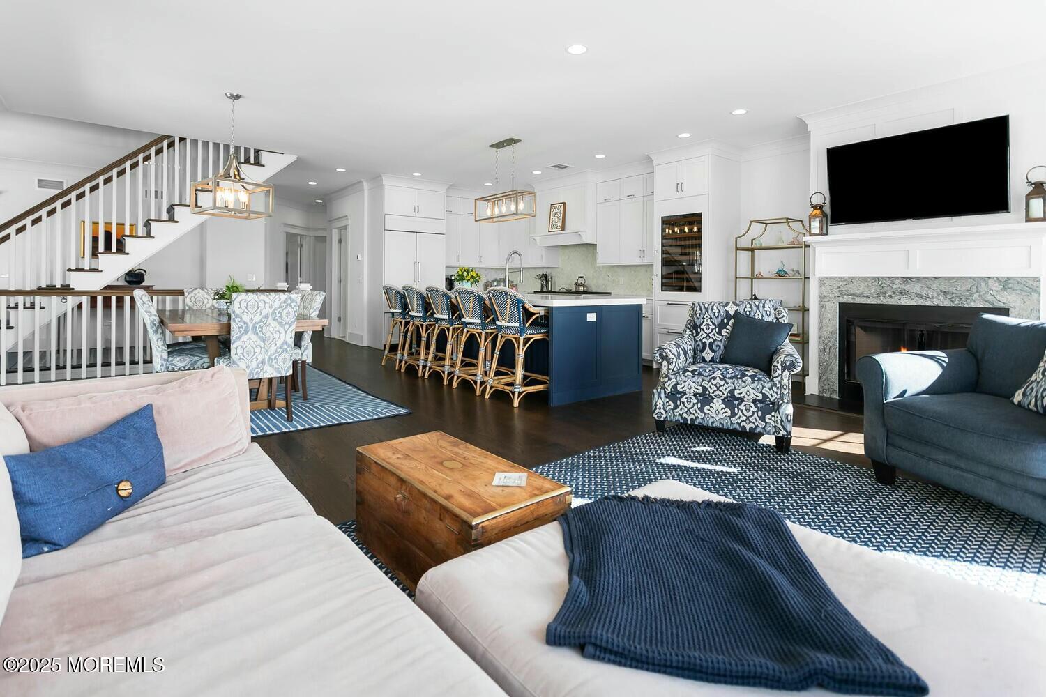 20 Riverview Place Sea Bright, NJ 07760 - Photo 16 of 107 a living room with fireplace furniture and a flat screen tv