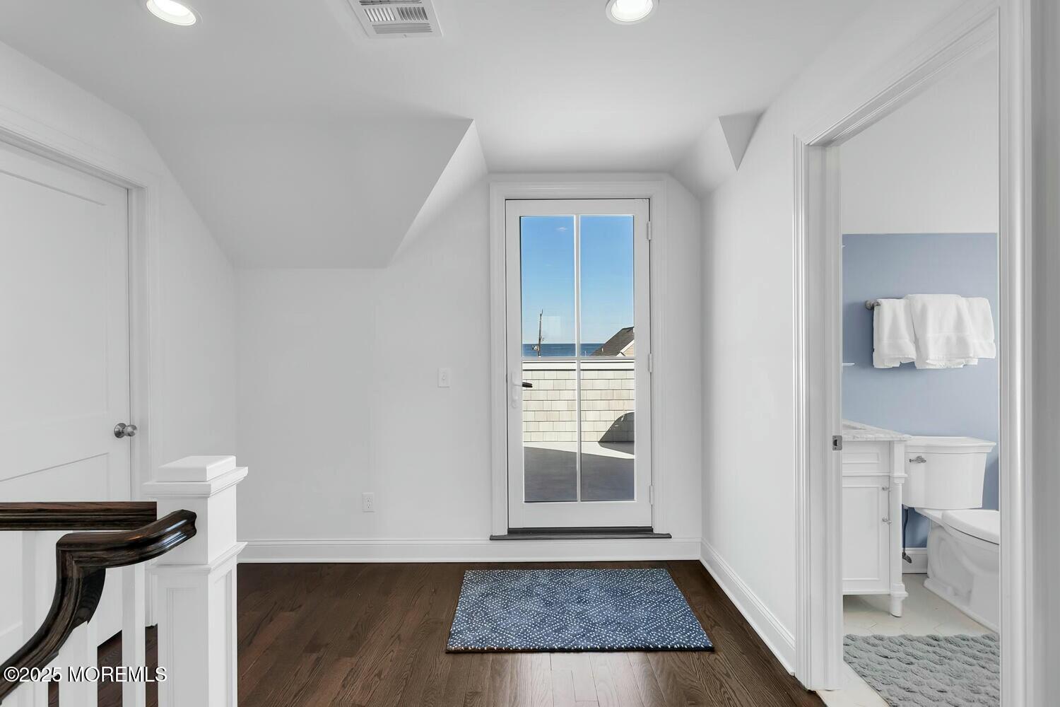 20 Riverview Place Sea Bright, NJ 07760 - Photo 51 of 107 a view of hallway with walk in closet and wooden floor