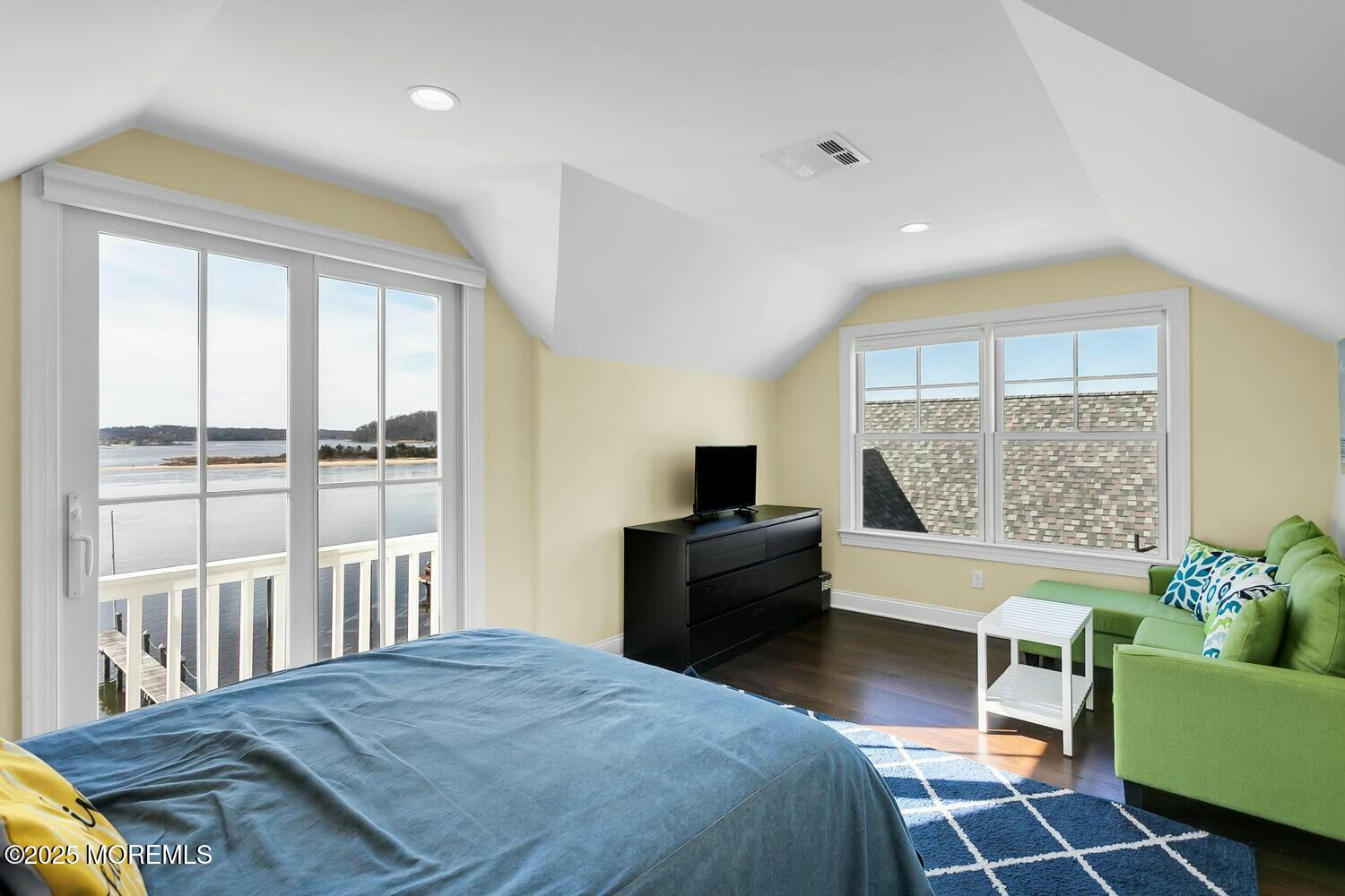 20 Riverview Place Sea Bright, NJ 07760 - Photo 55 of 107 a bedroom with a bed and a couch next to a window