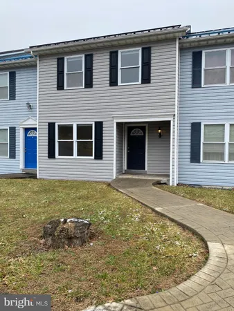 a view of a house with swimming pool