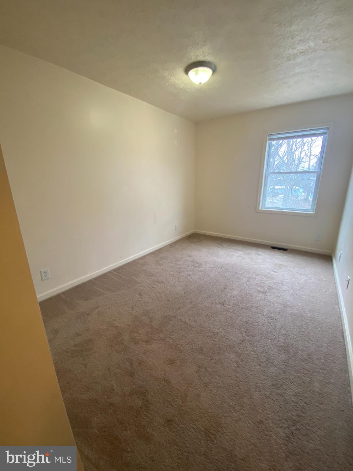 28 Holler Road, Unit 3 Keyser, WV 26726 - Photo 18 of 23 an empty room with windows