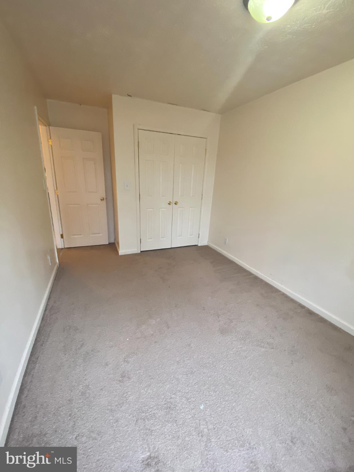 28 Holler Road, Unit 3 Keyser, WV 26726 - Photo 19 of 23 a view of an empty room and a window