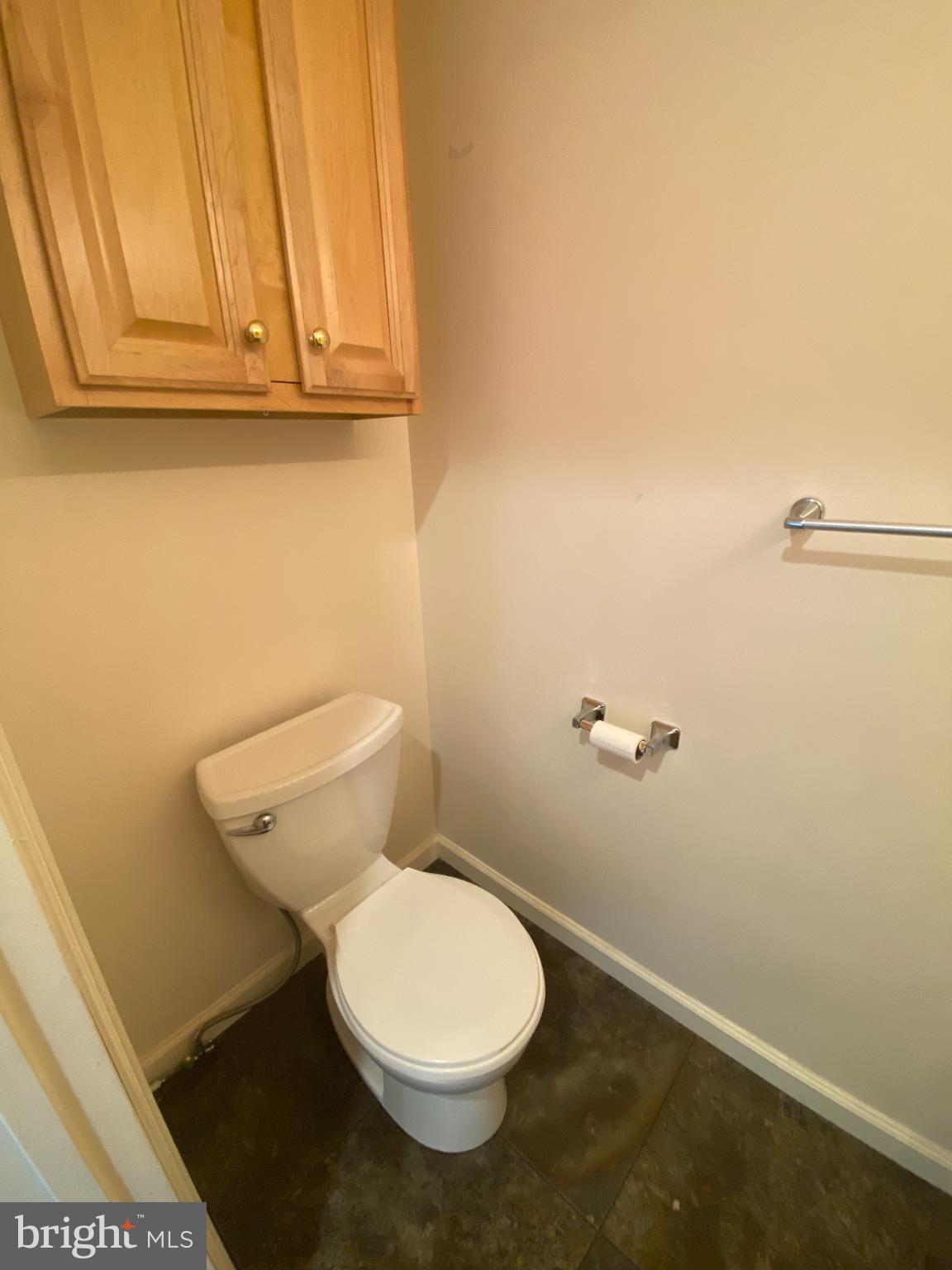 28 Holler Road, Unit 3 Keyser, WV 26726 - Photo 7 of 23 a white toilet sitting next to a sink