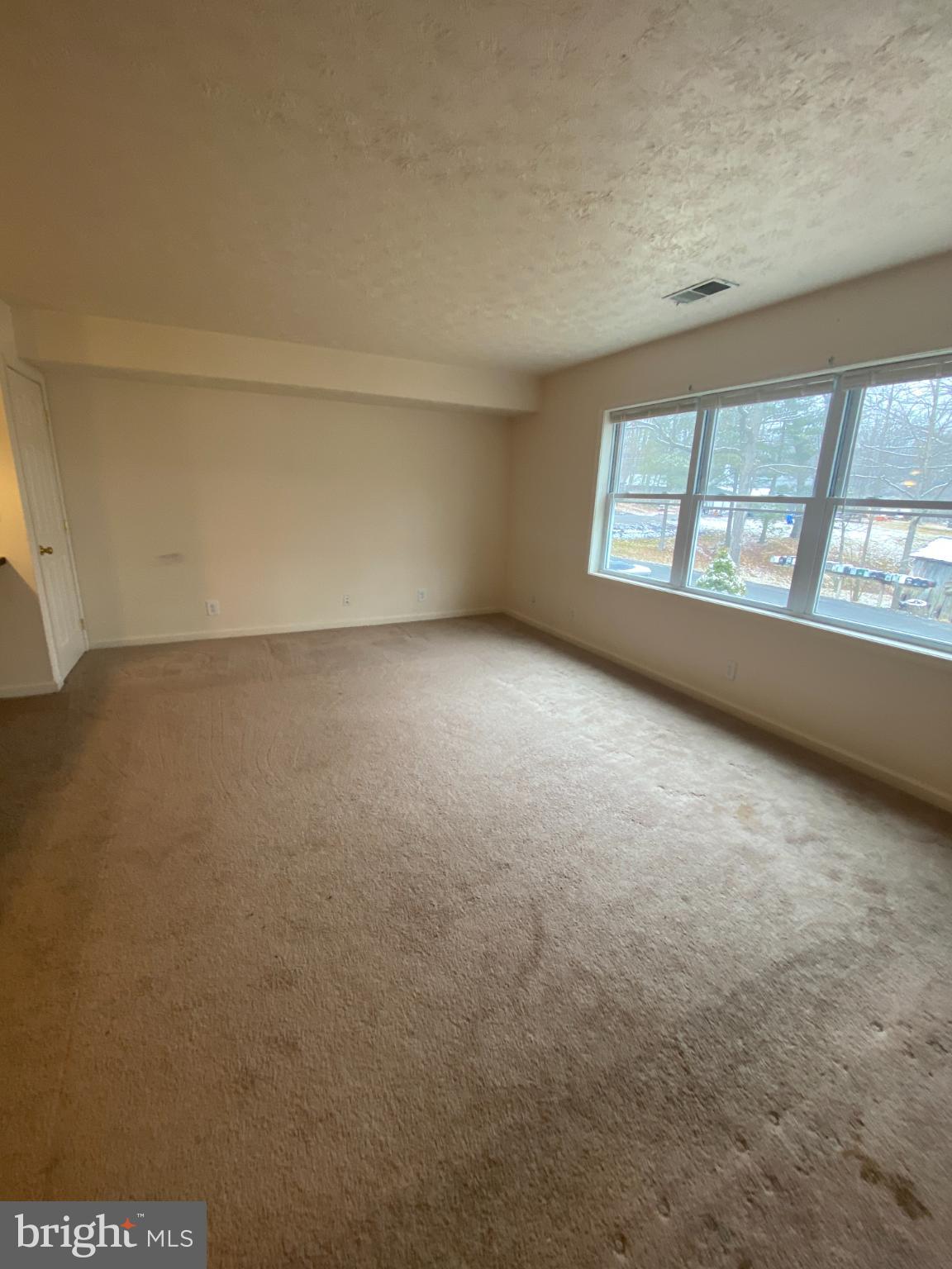 28 Holler Road, Unit 3 Keyser, WV 26726 - Photo 8 of 23 an empty room with windows