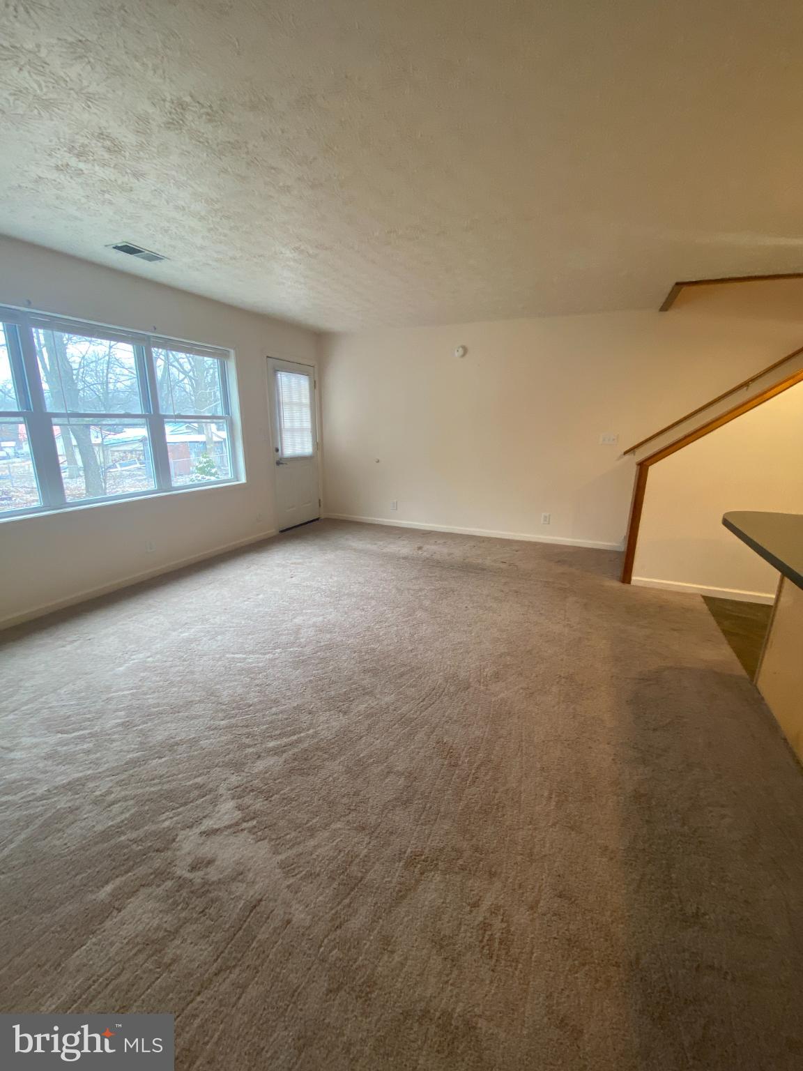 28 Holler Road, Unit 3 Keyser, WV 26726 - Photo 9 of 23 a view of an empty room with a window
