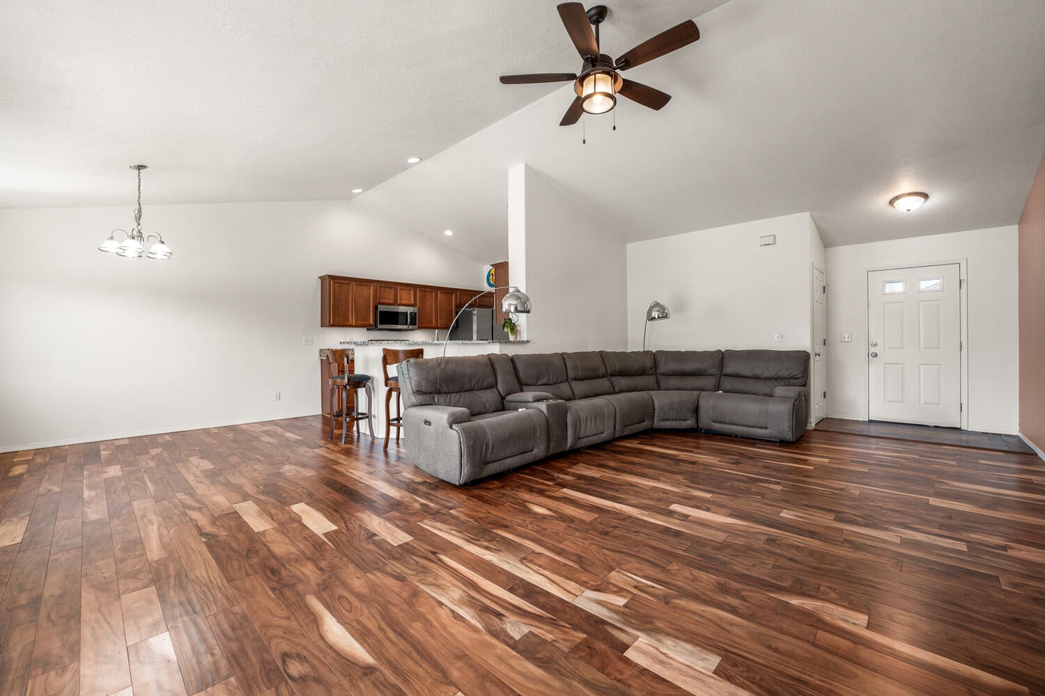 2820 Southwest Peridot Avenue Redmond, OR 97756 - Photo 5 of 20 Living room is open to the dining and kitchen.